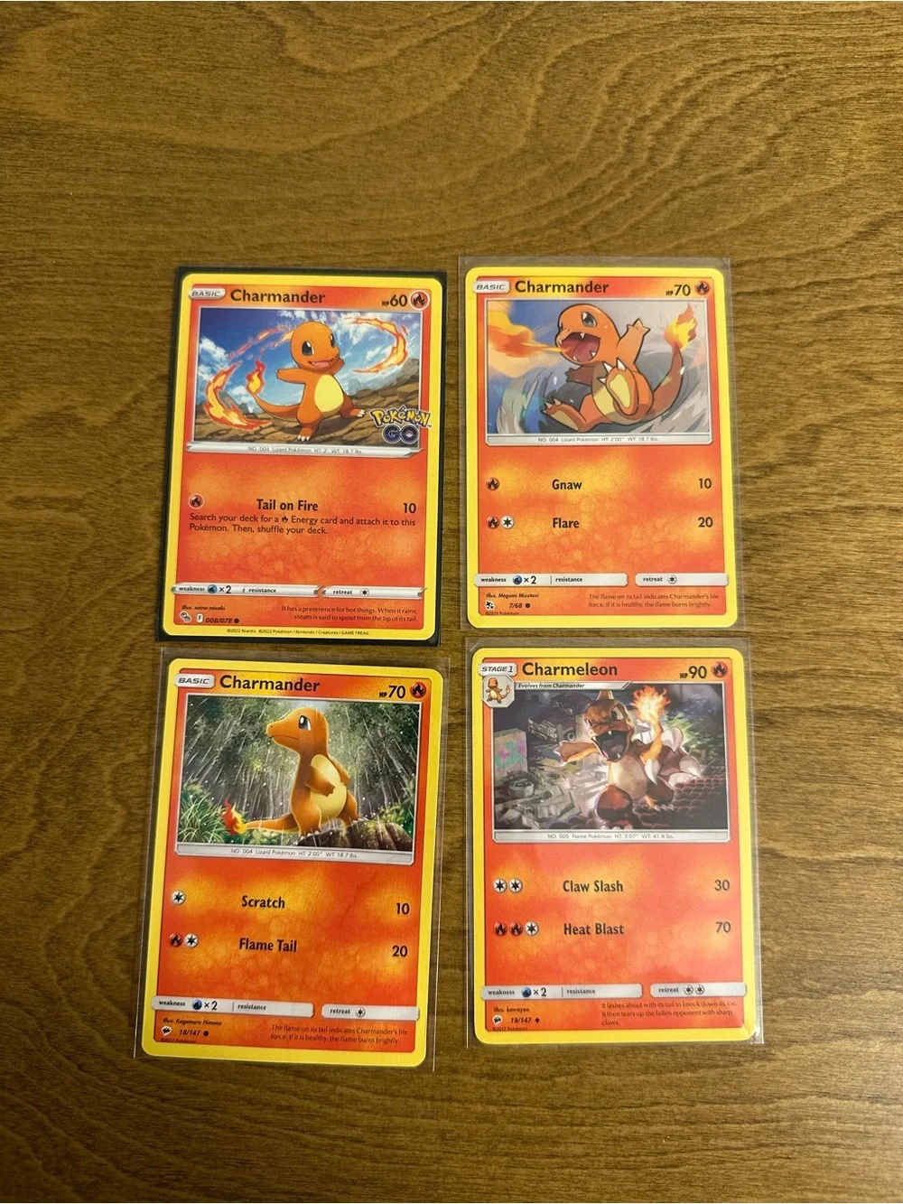 Lot of 4 Charmander and Charmeleon Pokemon Cards NM